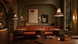 Warm hospitality interior with characterful lighting and seating